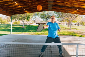 Man plays pickleball