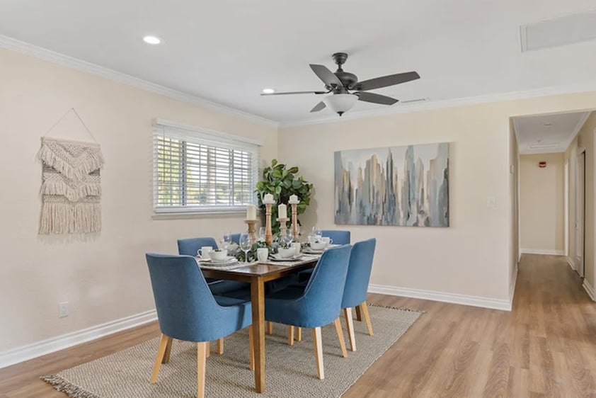 Dining room with blue chairs