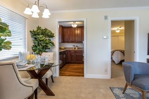 Dinette set with view through door to galley kitchen