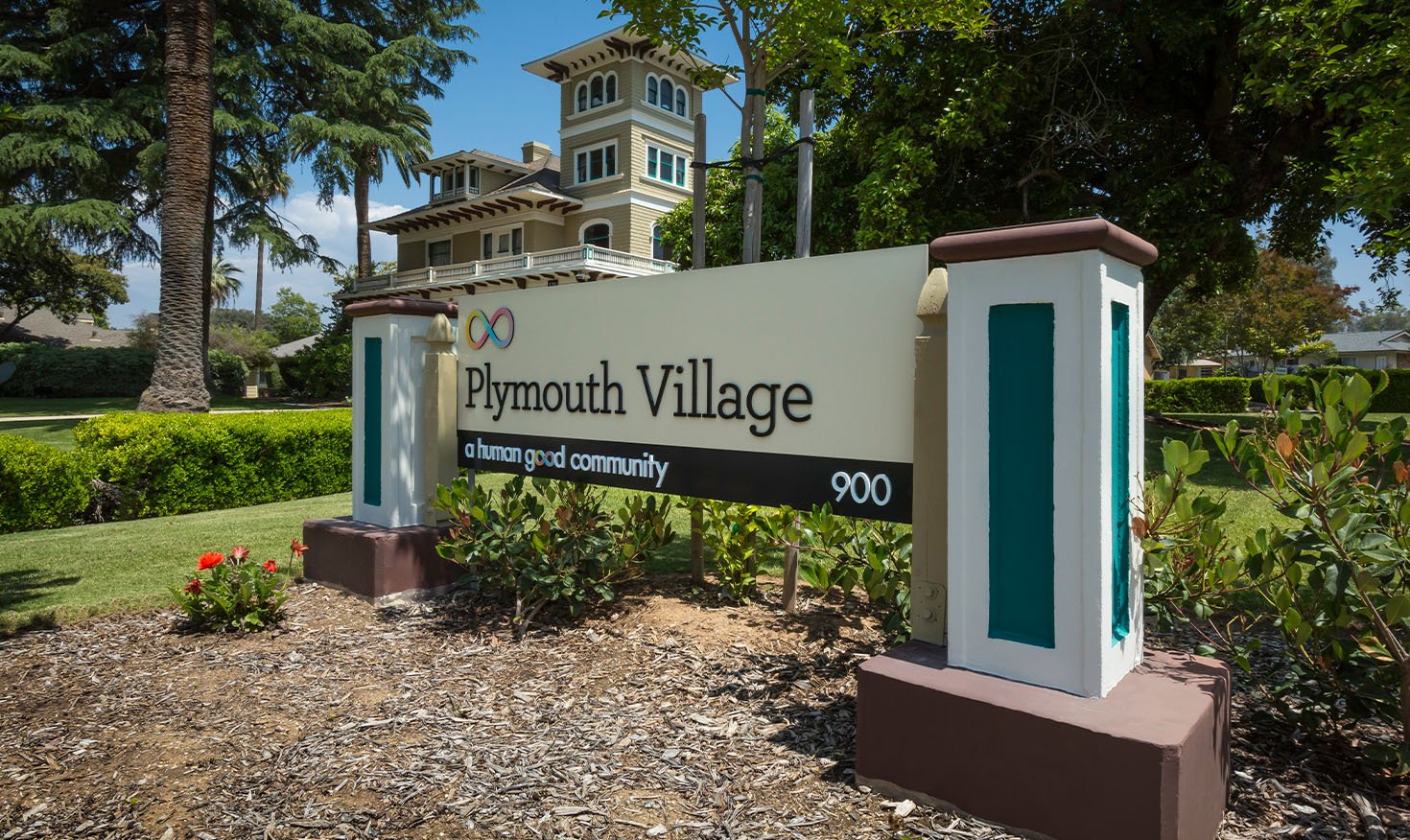 Sign with Victorian house
