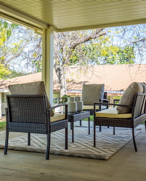 Private patios with chairs and tables