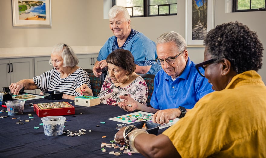 senior friends doing puzzles together