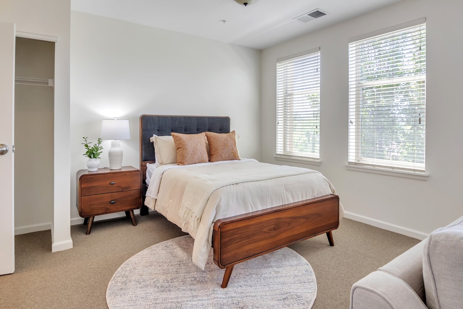 bedroom with cream and white blankets