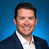 Headshot of Brett Drake, health services administrator