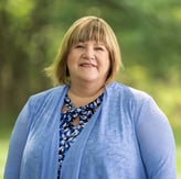 Headshot of Beth Slater-Plechner, sales director