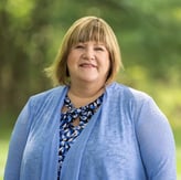 Headshot of Beth Slater-Plechner, sales director