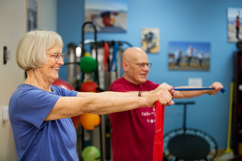 male and female residents exercise together